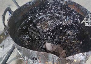 Sludge at the bottom of the tank