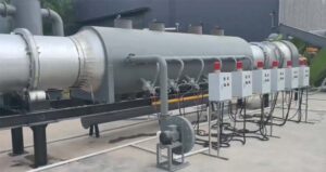 Recycled gas is utilized as a heat source for carbonization